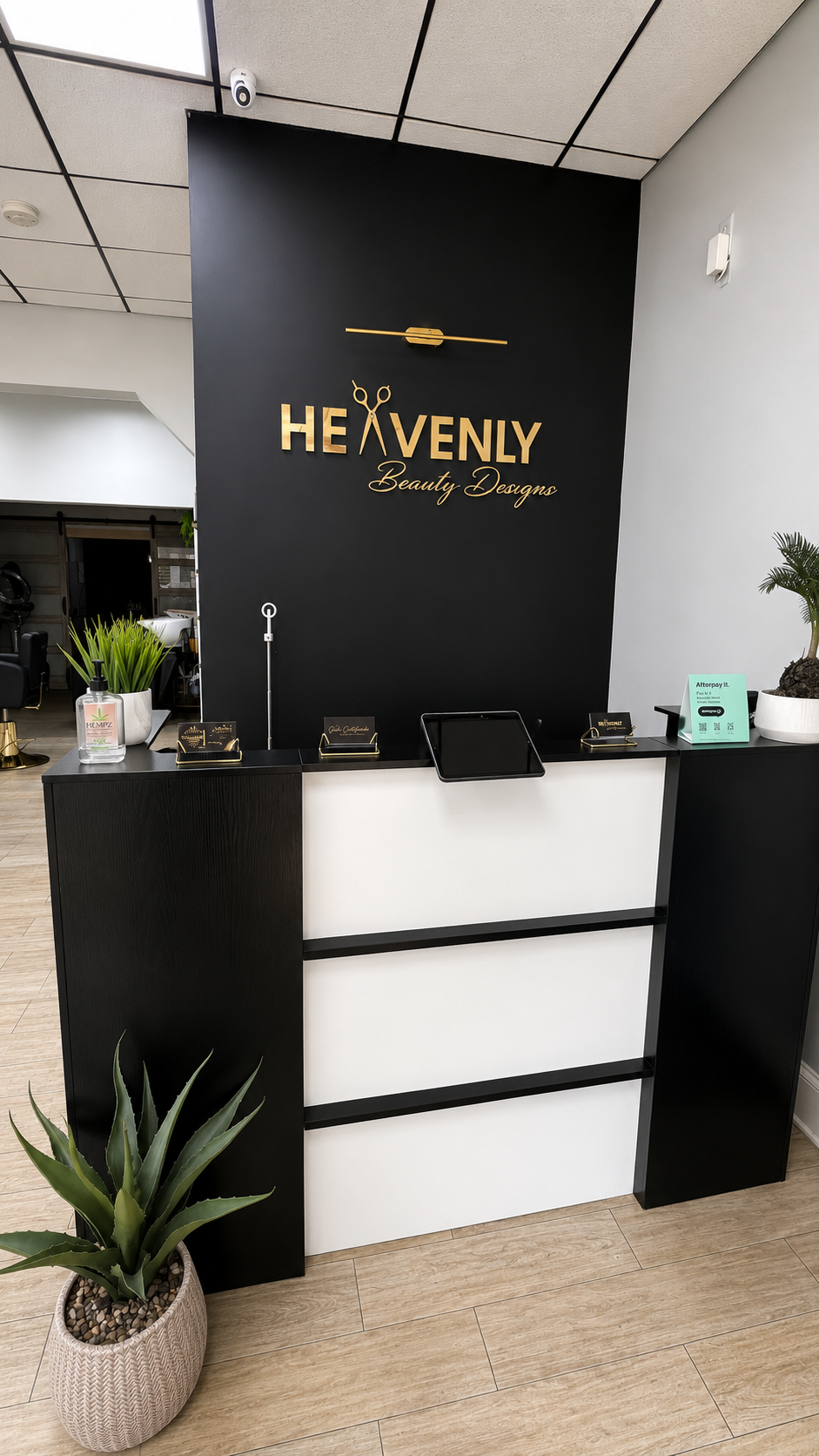 Reception desk with gold Heavenly Beauty Designs logo