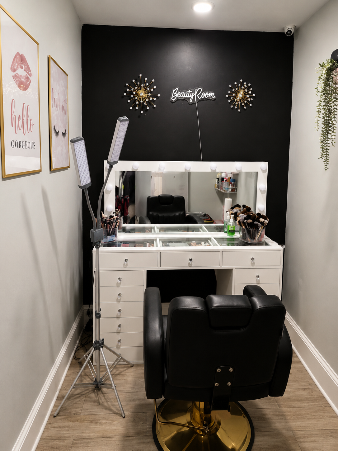 Makeup vanity station with illuminated mirror